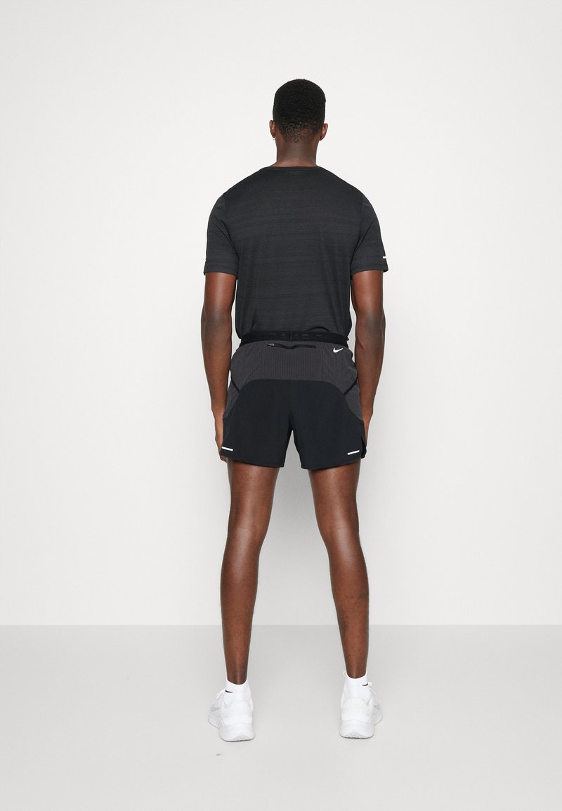 Nike Performance TRAIL - Kurze Sporthose - Black/smoke Grey/white