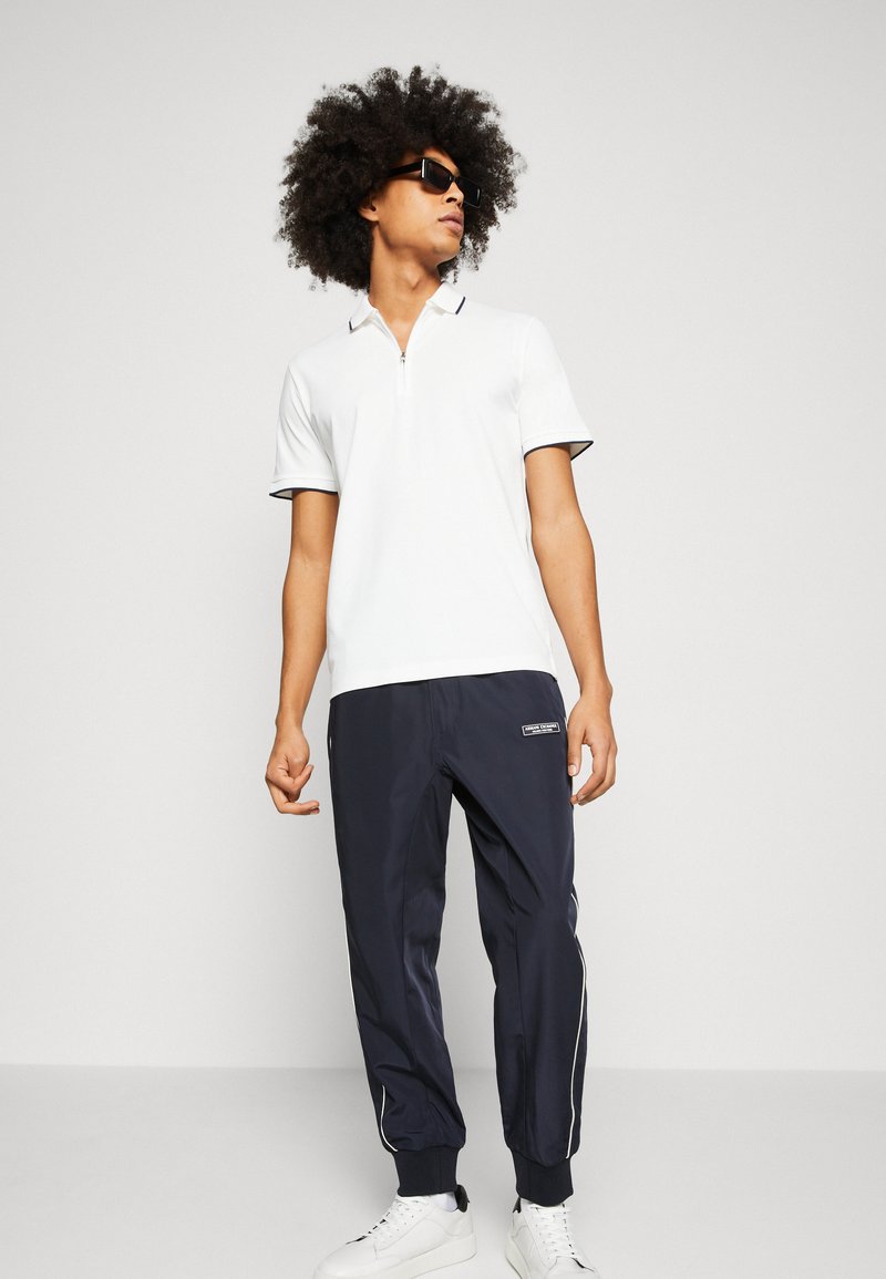Armani Exchange PANTALONI - Jogginghose - Deep Navy