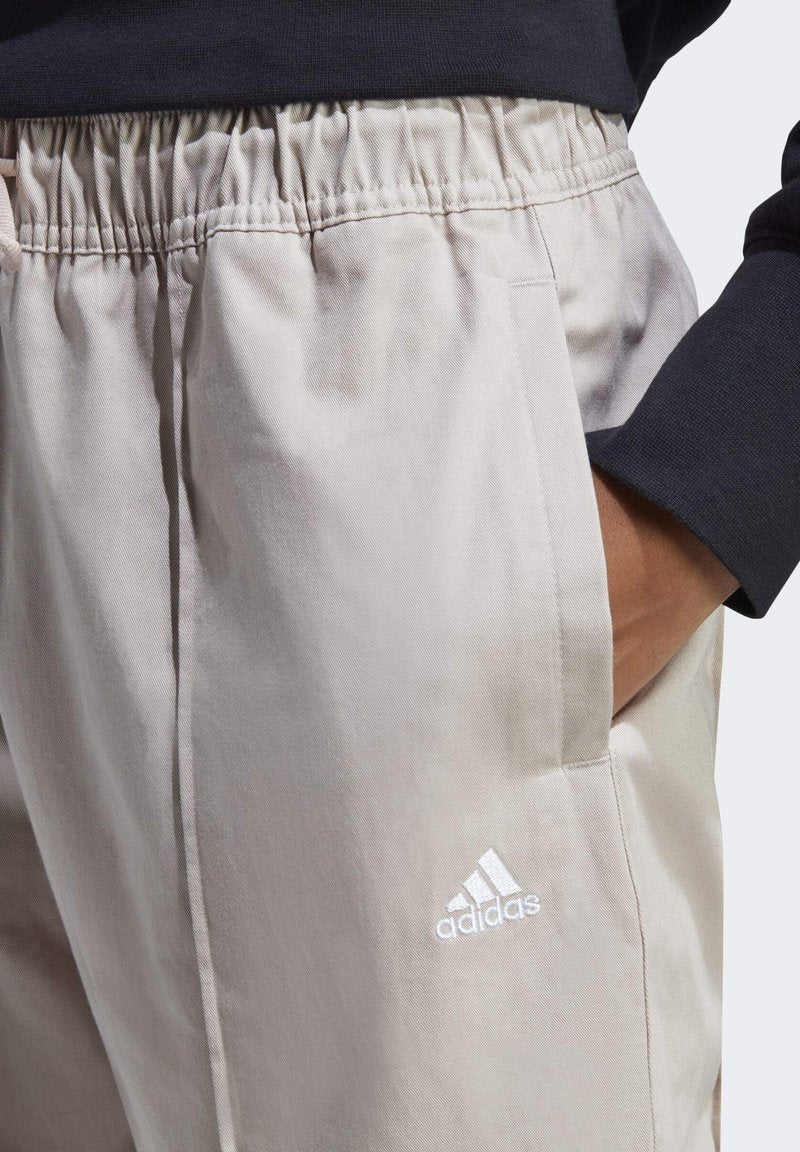 Adidas Sportswear WITH HEALING CRYSTALS INSPIRED GRAPHICS - Jogginghose - Taupe/white