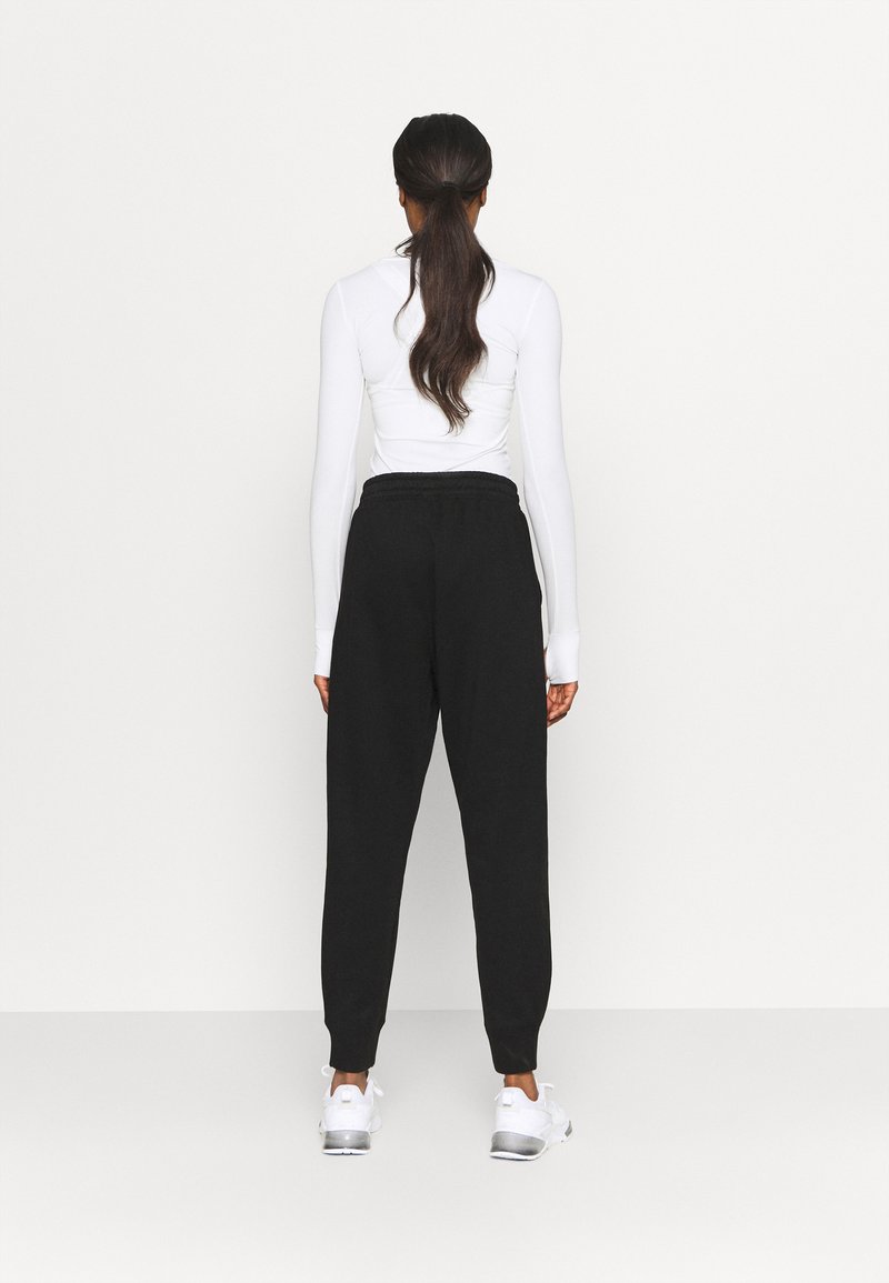 Puma TRAIN FAVORITE PANT - Jogginghose - Black