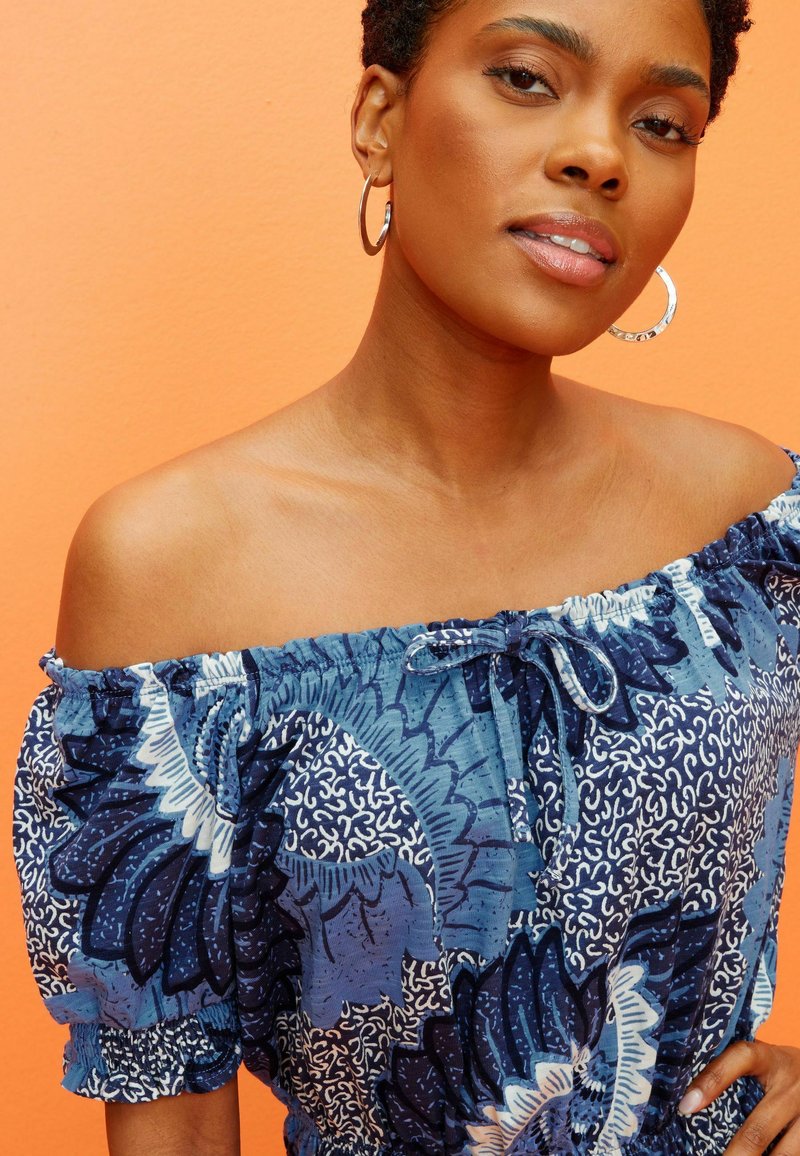 Next PUFF SLEEVE BARDOT PLAYSUIT STANDARD - Jumpsuit - Navy Blue Floral