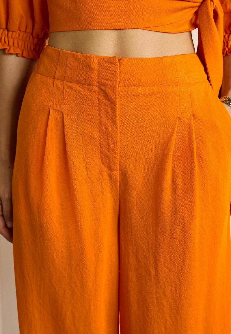 Next WIDE LEG STANDARD - Stoffhose - Orange
