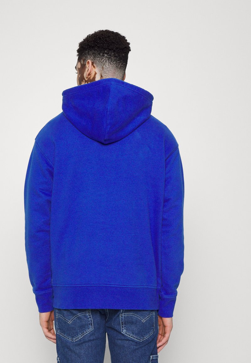  RELAXED GRAPHIC UNISEX - Kapuzenpullover - Surf Blue