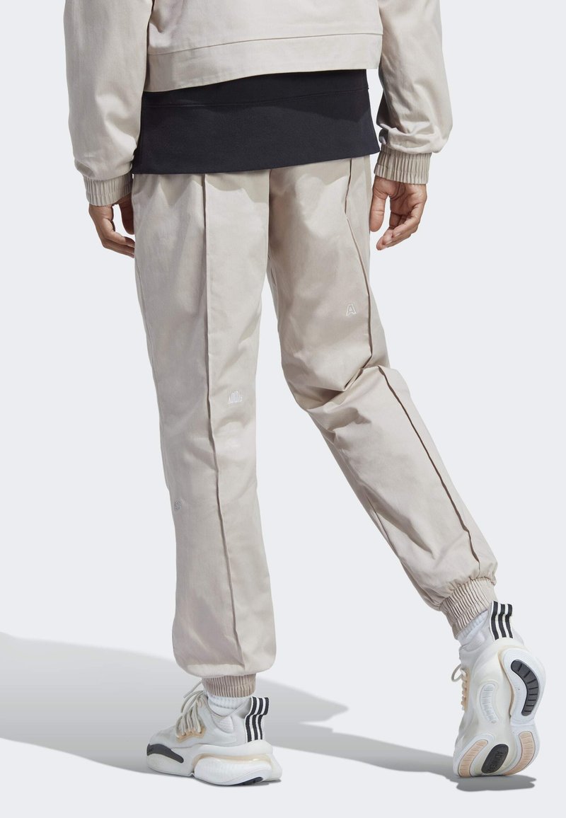 Adidas Sportswear WITH HEALING CRYSTALS INSPIRED GRAPHICS - Jogginghose - Taupe/white