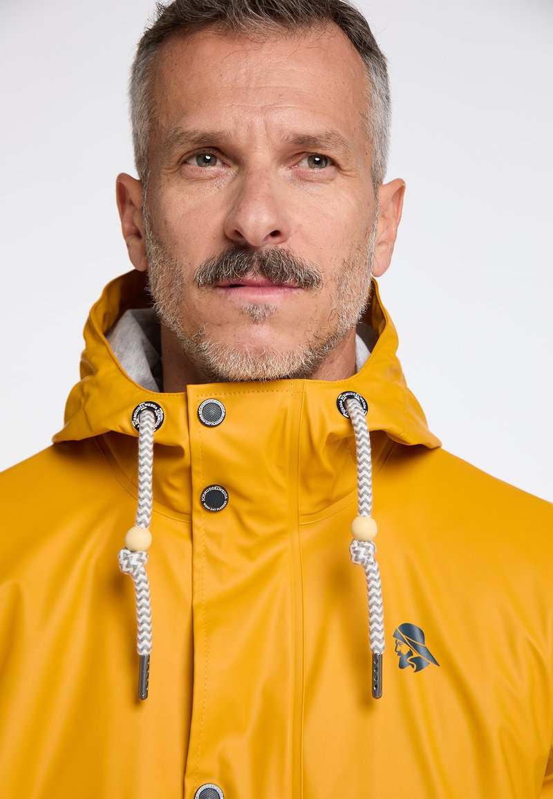 Schmuddelwedda Parka - Senf