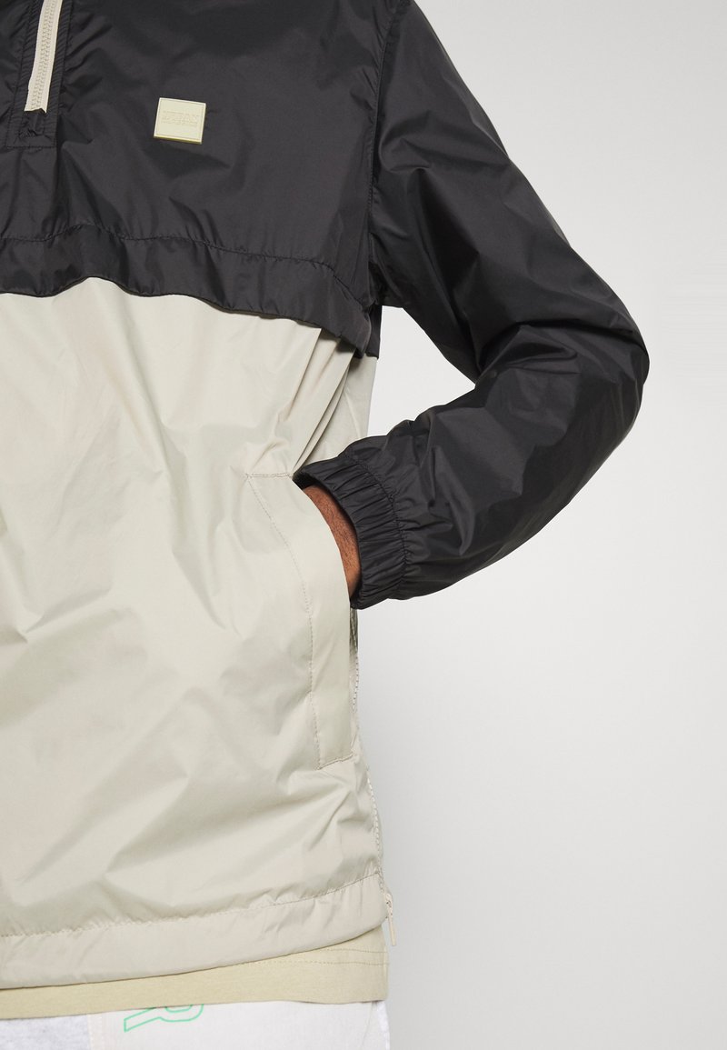 URBAN CLASSICS STAND UP COLLAR PULL OVER - Windbreaker - Black/concrete