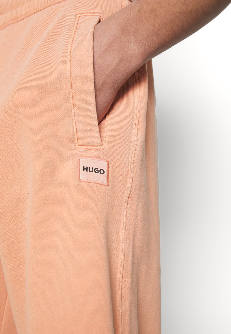 Hugo DINEZI - Jogginghose - Open Orange