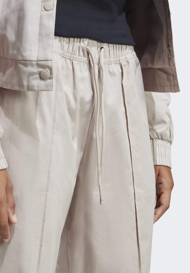 Adidas Sportswear WITH HEALING CRYSTALS INSPIRED GRAPHICS - Jogginghose - Taupe/white