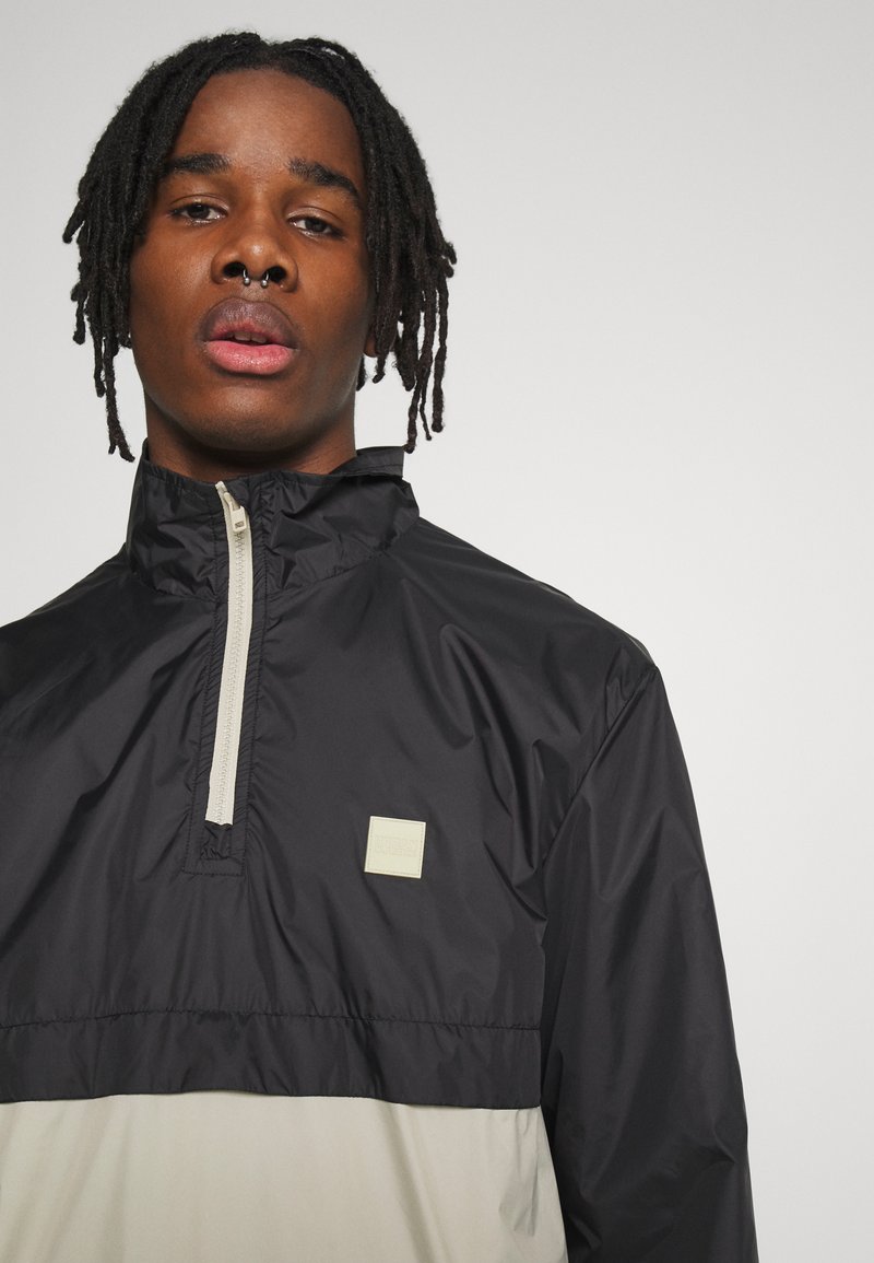URBAN CLASSICS STAND UP COLLAR PULL OVER - Windbreaker - Black/concrete