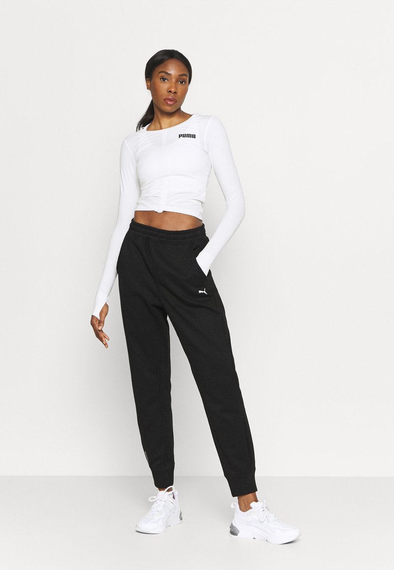 Puma TRAIN FAVORITE PANT - Jogginghose - Black
